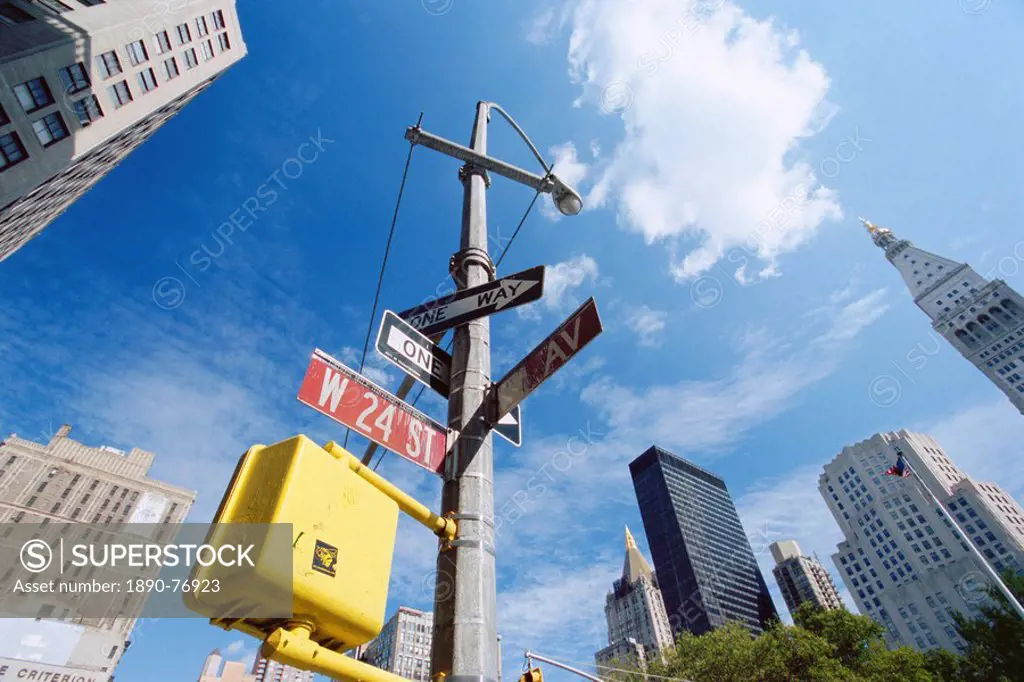Street signs and skyscrapers, W24th Street, New York City, New York, USA, North America