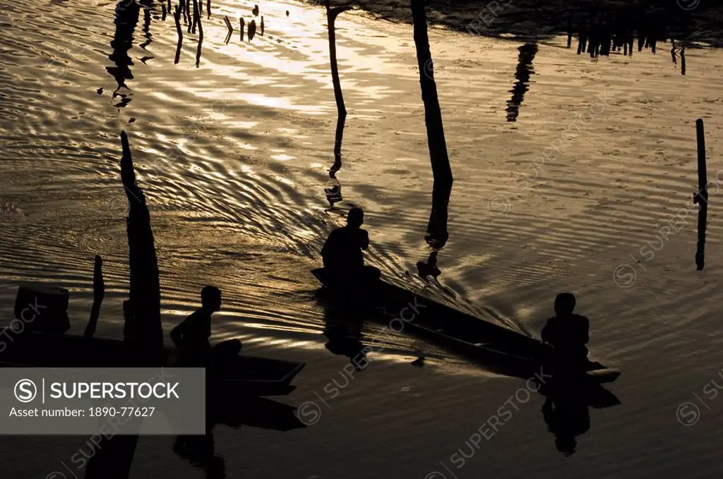 Boats at dusk, Meekong River, Laos, Asia