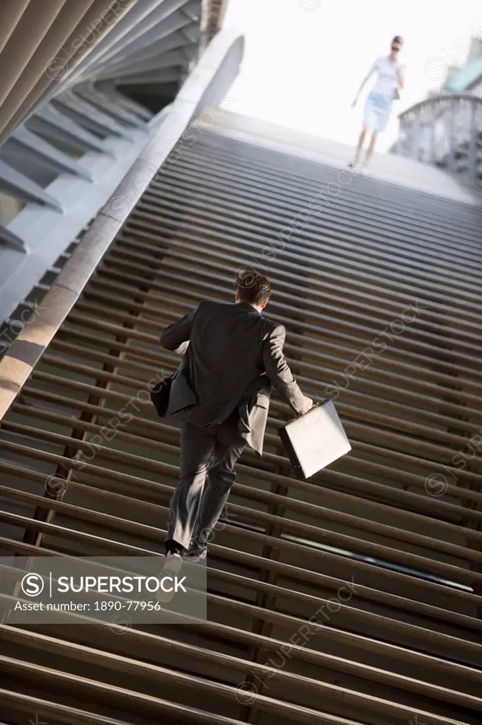 Man on stairs, Paris, France, Europe