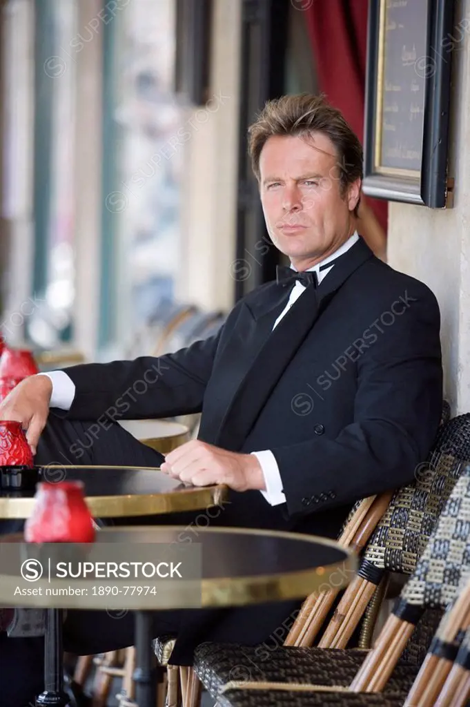 Business man in cafe, Paris, France, Europe