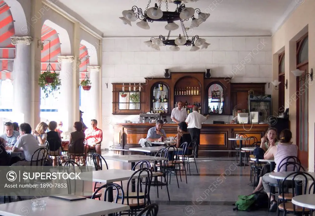 The veranda cafe and bar at the Casa Granda Hotel, Parque Cespedes, Santiago de Cuba, Cuba, West Indies, Central America