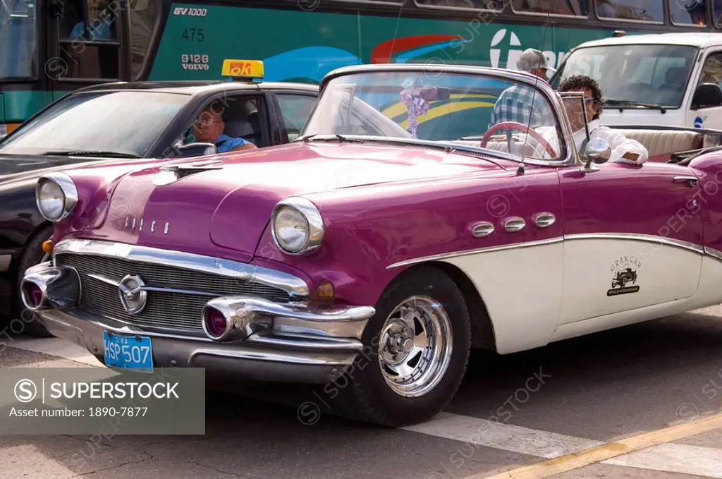 A vintage 1950´s American car used for taking tourists sightseeing, Havana, Cuba, West Indies, Central America