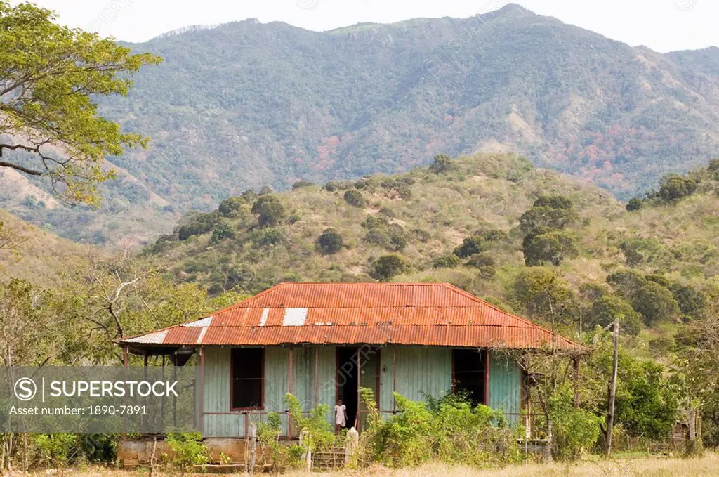 A typical tin roofed house in the mountains near Santiago de Cuba, Cuba, West Indies, Central America