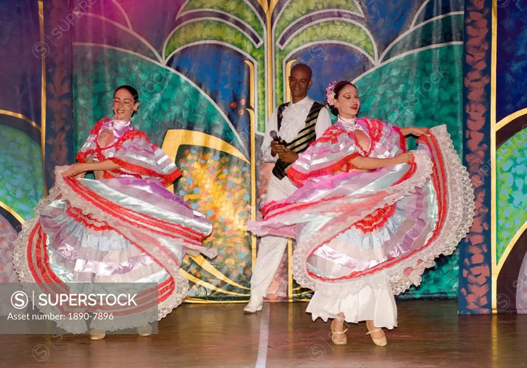 Flamenco dancers in colourful costume performing at the Melia Rio de Oro Hotel, Playa Esmeralda, Guardalavaca, Cuba, West Indies, Central America