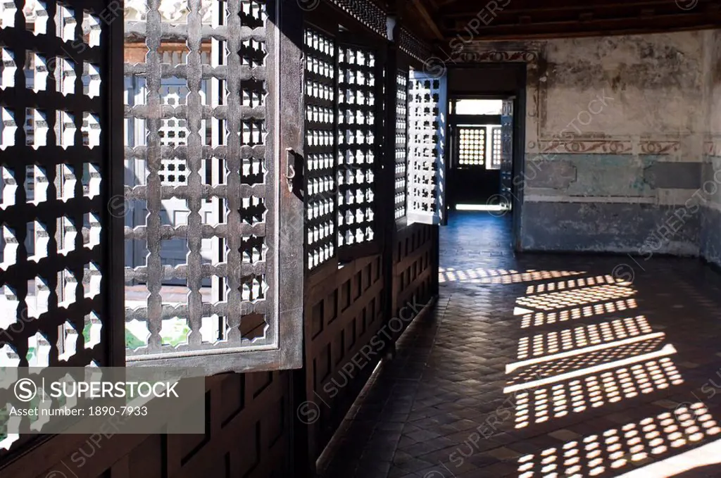 Moorish style wooden screens surrounding a courtyard at the Casa de Diego Velazquez Museo de Ambiente Historico Cubano, Santiago de Cuba, Cuba, West I...