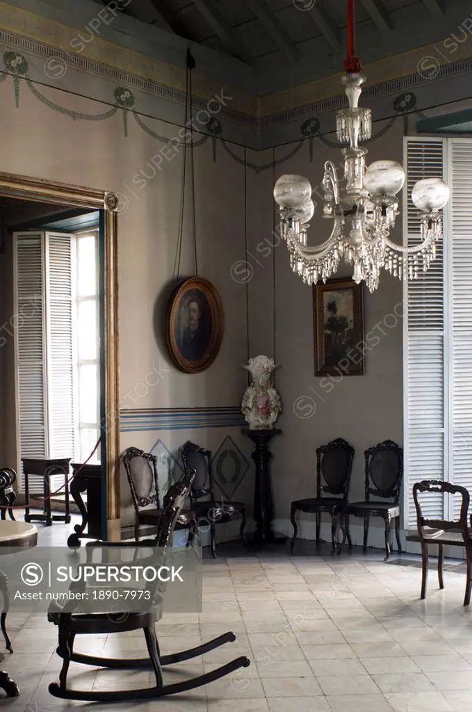 An ornately decorated room in the Casa de Diego Velazquez which is also the Museo de Ambiente Historico Cubano,Santiago de Cuba, Cuba, West Indies, Ce...