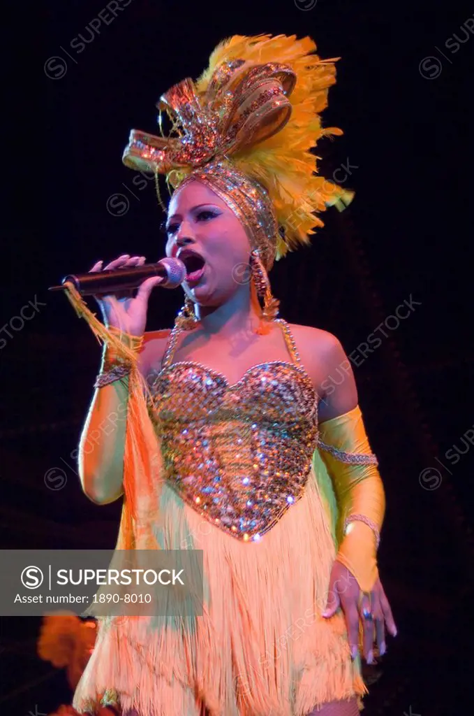A colurfully attired singer at the Tropicana nightclubHavana, Cuba, West Indies, Central America