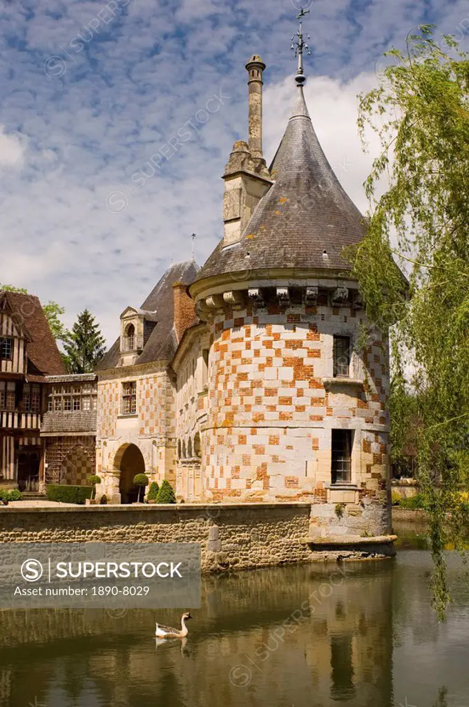 Checked tower of the chateau of St._Germanine_de_Livet and surrounding moat, Normandy, France, Europe