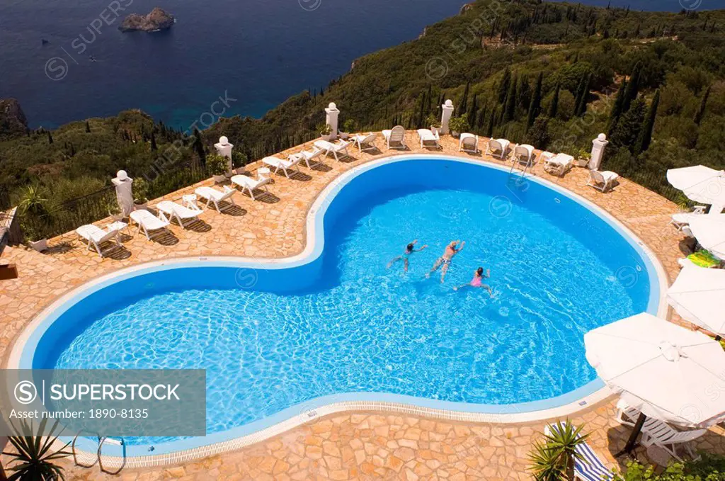 An overhead view of a swimming pool on a clifftop at Paleokastritsa, west coast, Corfu, Ionian Islands, Greek Islands, Greece, Europe