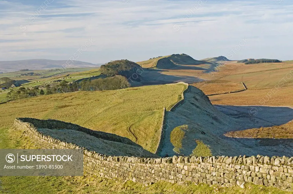 Looking west from Kings Hill to Housesteads Roman Fort and crag, Cuddy and Hotbank Crags, Hadrians Wall, UNESCO World Heritage Site, Northumberland No...
