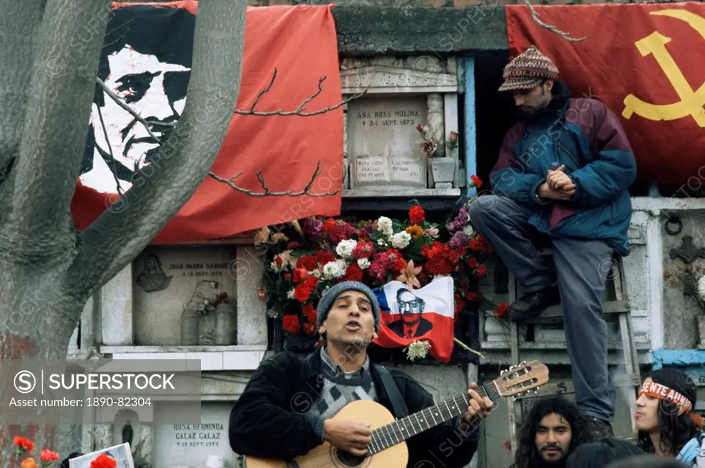 Guitarist plays Victor Jara songs at his grave on 11th de Septiembre, remembering Victor Jara whose hands were cut off in the National Stadium and who...