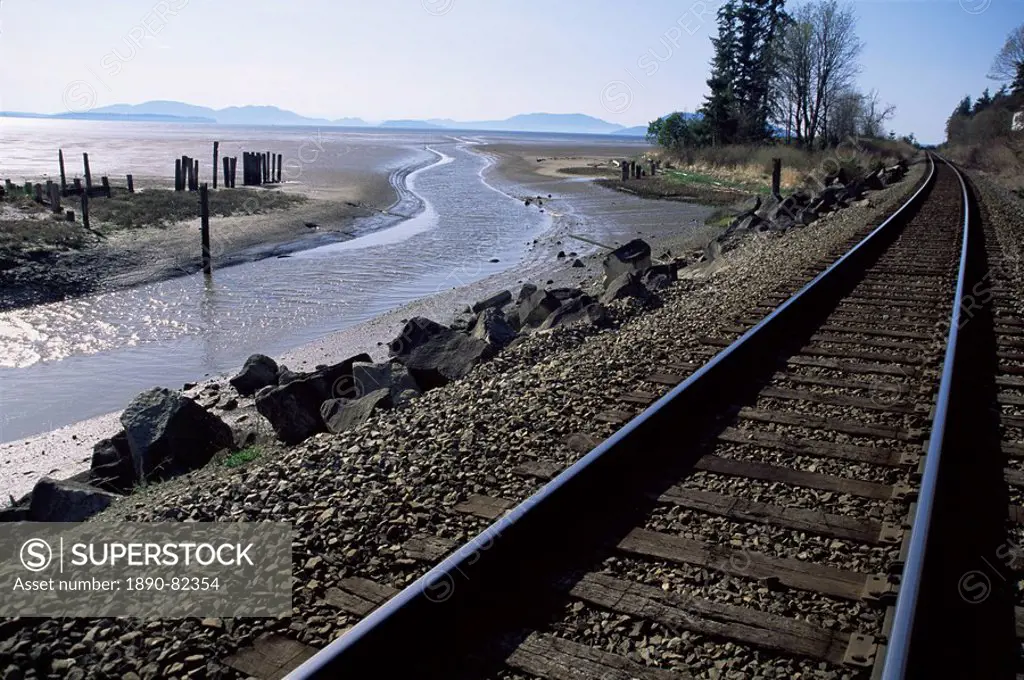 Train tracks leading to Bellingham, with San Juan Islands in distance, Washington State, United States of America U.S.A., North America