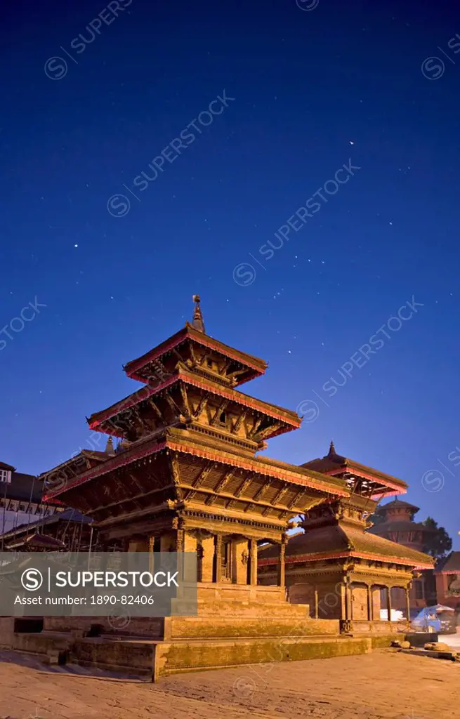 Orion in sky at dawn above triple roofed pagoda temple in foreground and Indrapur temple to the right, Durbar Square, Kathmandu, UNESCO World Heritage...