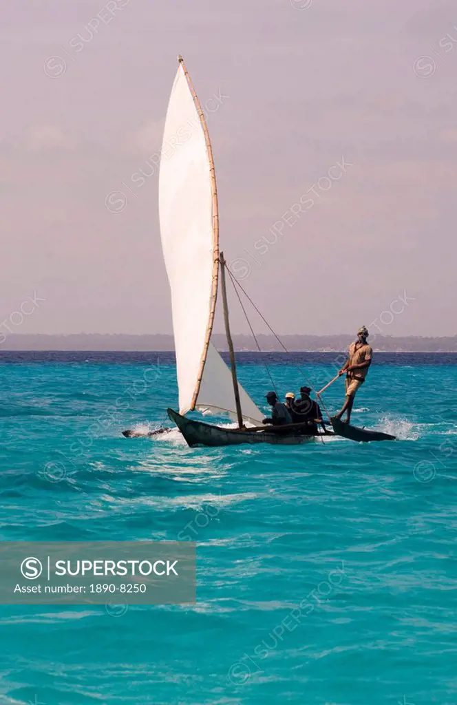 A traditional wooden sailing dhow near Mnemba Island, Zanzibar, Tanzania, East Africa, Africa