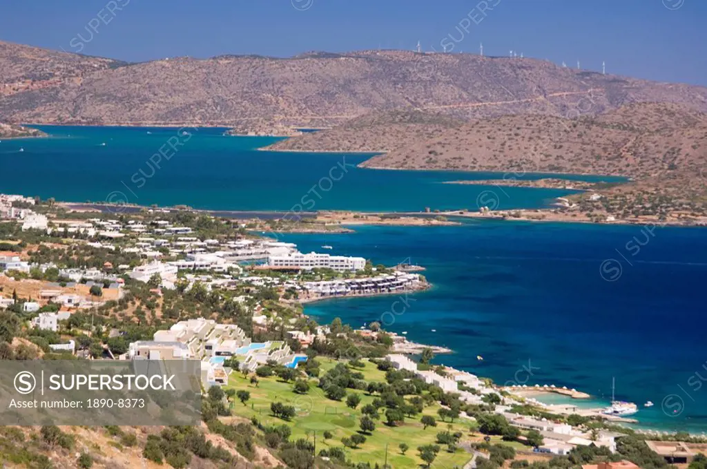 An aerial view of the coast around the resort of Elounda, Crete, Greek Islands, Greece, Europe