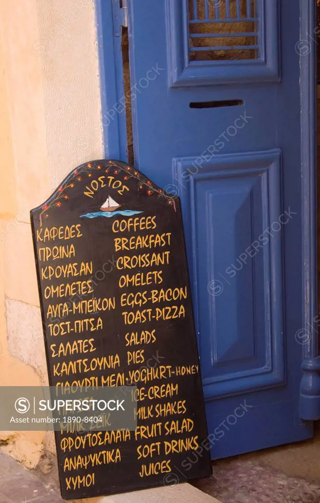 A chalkboard menu outside a taverna on a small back street in Hania, Crete, Greek Islands, Greece, Europe