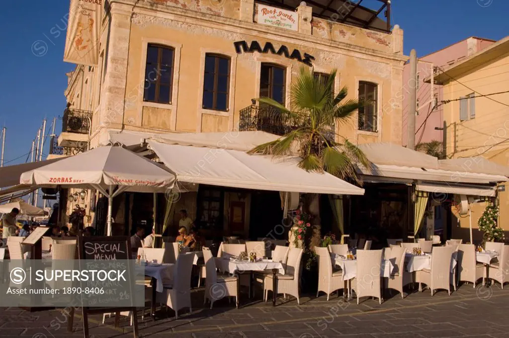 A taverna on the harbour in the old section of Hania, Crete, Greek Islands, Greece, Europe