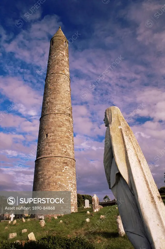 Statue of the Virgin, Round tower, 30m tall, of St. Declan´s cathedral, dating from 12th century, Ardmore, County Waterford, Munster, Republic of Irel...