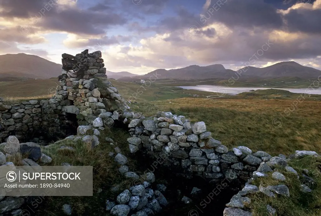 Old blackhouse ruin near Timsgarry Timsgearraidh at sunset, Isle of Lewis, Outer Hebrides, Scotland, United Kingdom, Europe