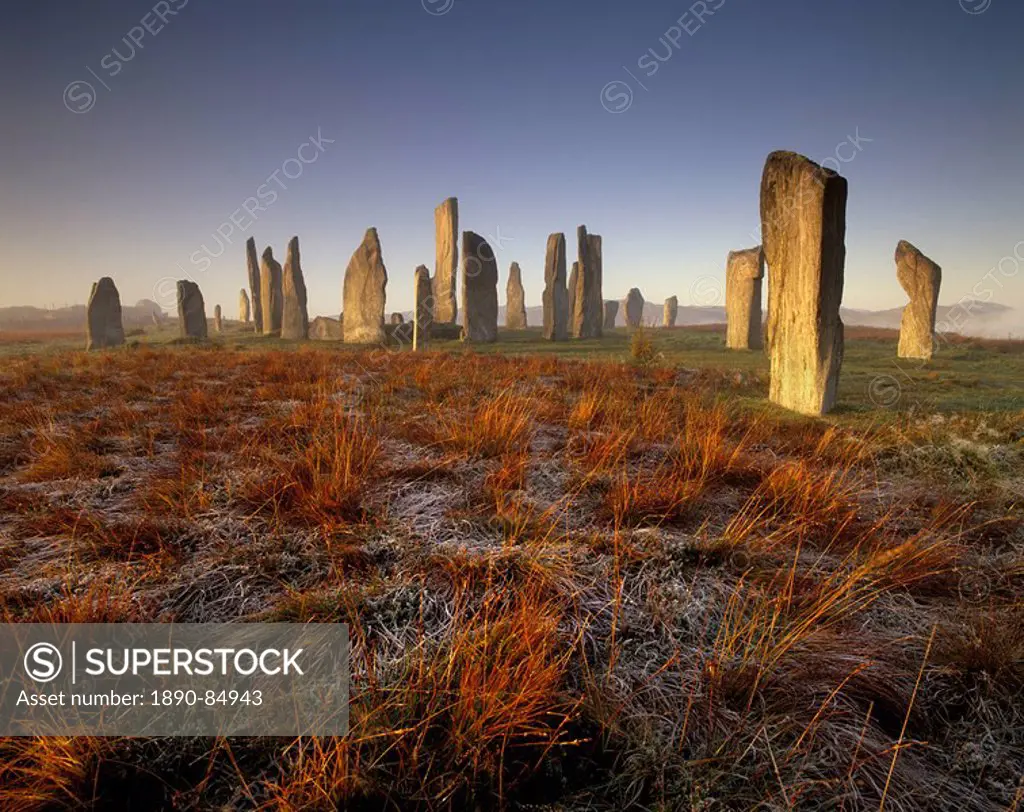 Callanish Callanais Stone Circle dating from Neolithic period between 3000 and 1500 BC, at dawn, Isle of Lewis, Outer Hebrides, Scotland, United Kingd...