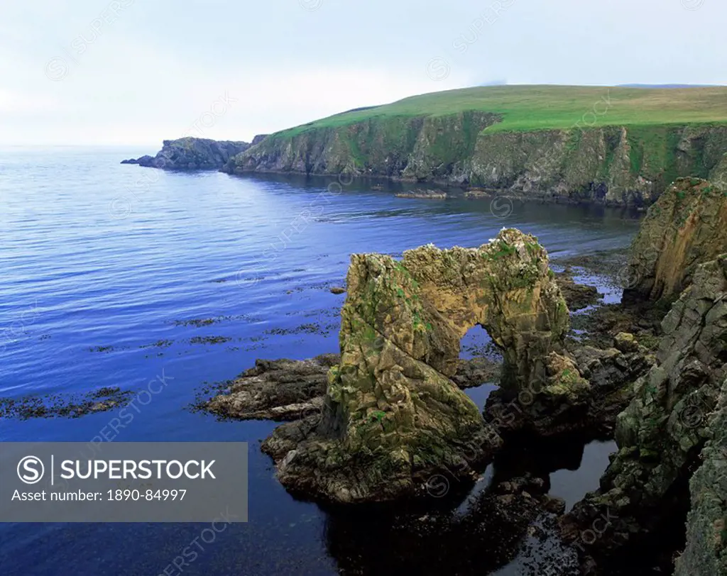 Natural arch on the east coast, Fair Isle, Shetland Islands, Scotland, United Kingdom, Europe