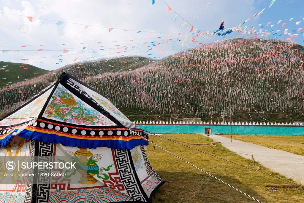 Tent and thousands of prayer flags, Tagong Grasslands, Sichuan, China, Asia