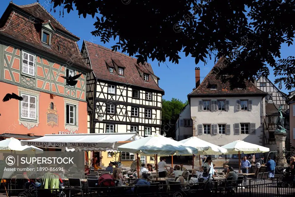 Half timbered and painted buildings and restaurants, Colmar, Haut Rhin, Alsace, France, Europe