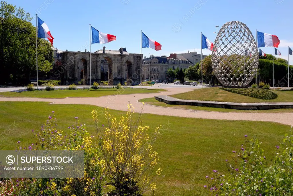 French flags and modern sculpture, Place de la Republique, looking towards Porte de Mars Roman arch, Reims, Marne, Champagne_Ardenne, France, Europe