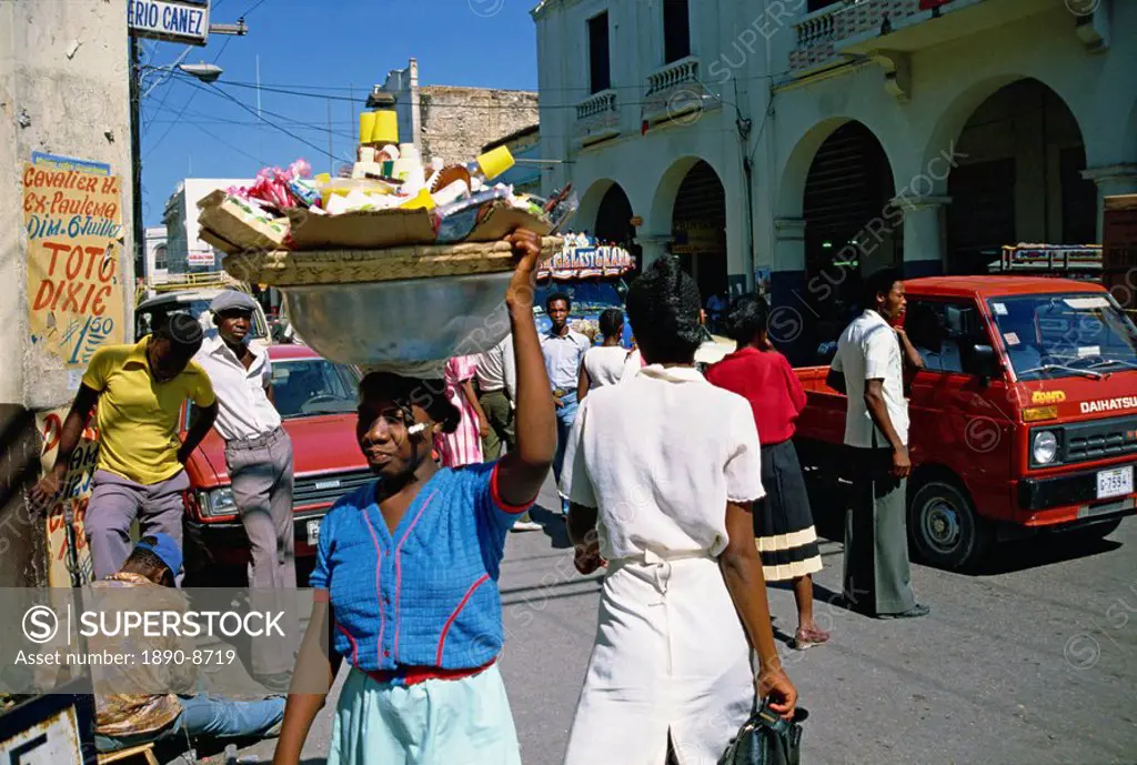 Street scene, including woman carrying goods on head, Port au Prince, Haiti, Caribbean, Central America