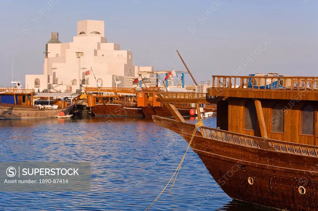 Dhow in front of the Museum of Islamic Art, designed by the renowned architect IM Pei, which has the largest collection of Islamic art in the world, D...