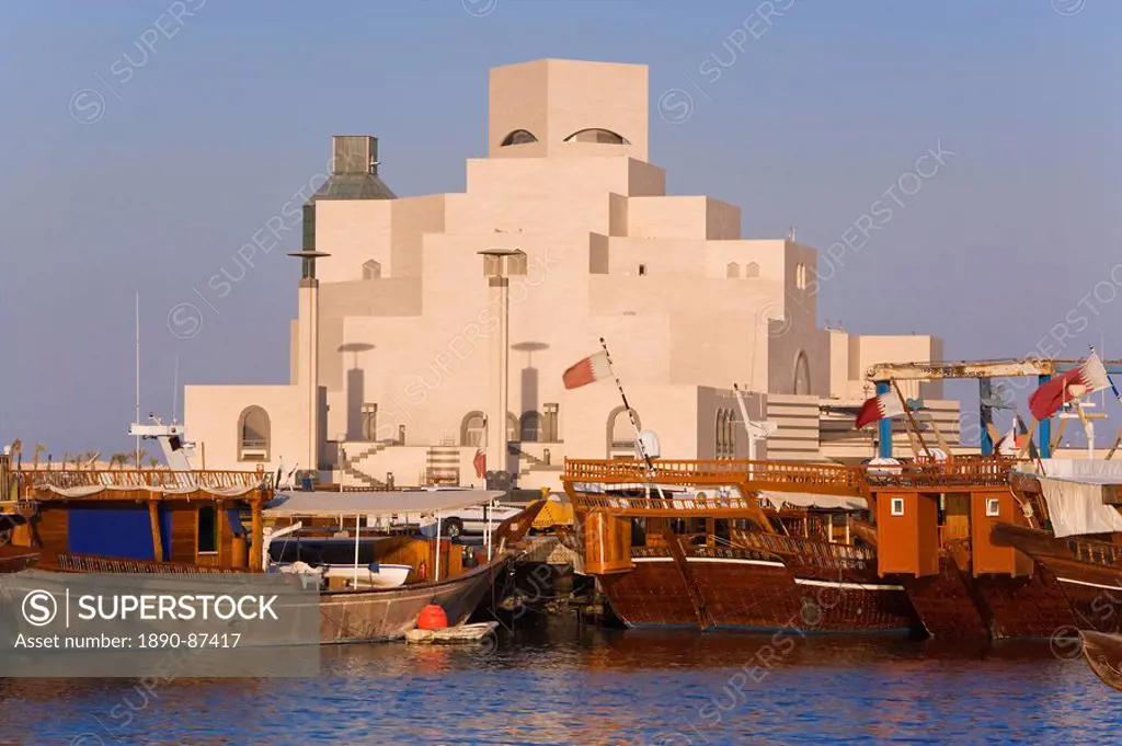 Dhow in front of the Museum of Islamic Art, designed by the renowned architect IM Pei, which has the largest collection of Islamic art in the world, D...