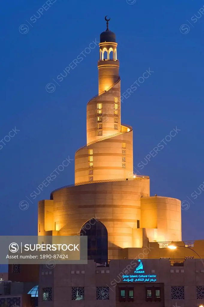 The illuminated spiral mosque of the Kassem Darwish Fakhroo Islamic Centre in Doha based on the Great Mosque of Al_Mutawwakil in Samarra in Iraq, Doha...