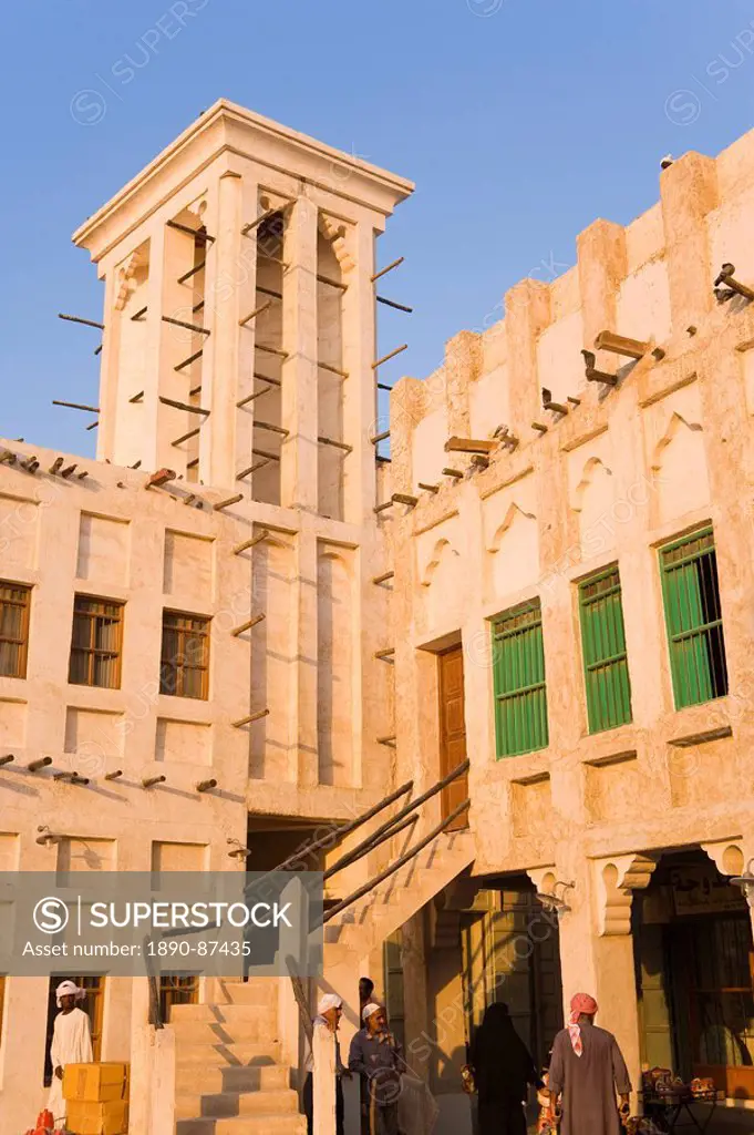 The restored Souq Waqif with mud rendered shops and exposed timber beams, Doha, Qatar, Middle East