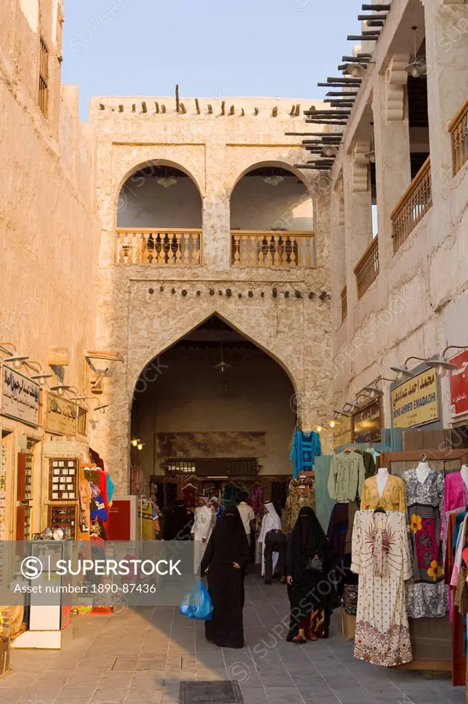 The restored Souq Waqif with mud rendered shops and exposed timber beams, Doha, Qatar, Middle East