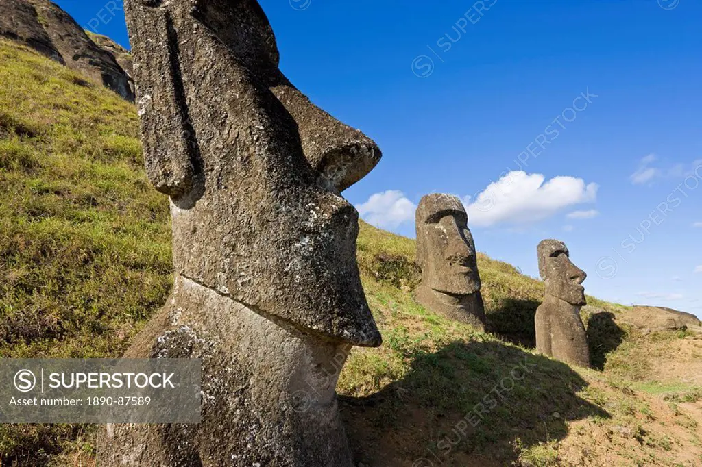 Giant monolithic stone Moai statues at Rano Raraku, Rapa Nui Easter Island, UNESCO World Heritage Site, Chile, South America