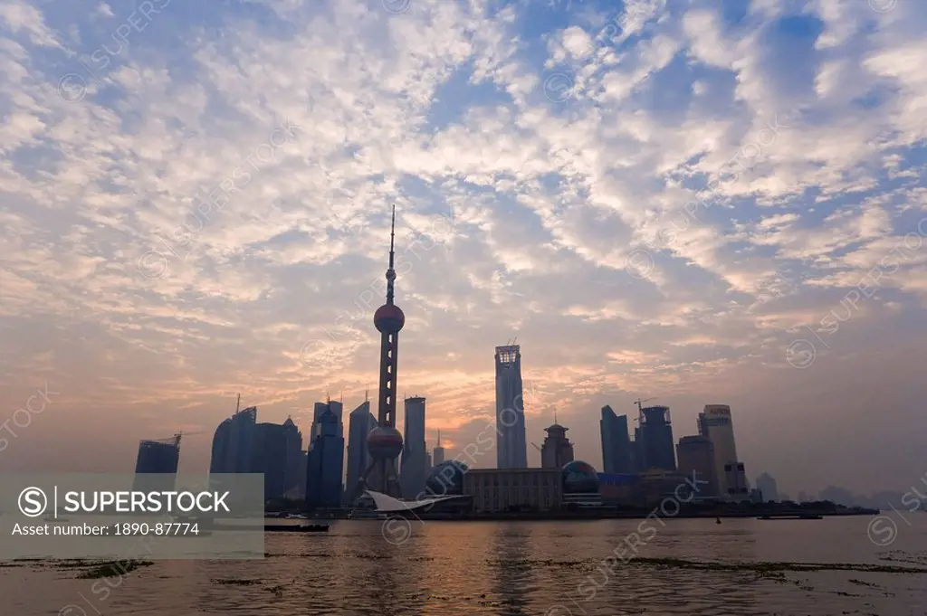 View of Oriental Pearl TV Tower and highrises in the Pudong New Area viewed across the Huangpu River from the Bund, Shanghai, China, Asia