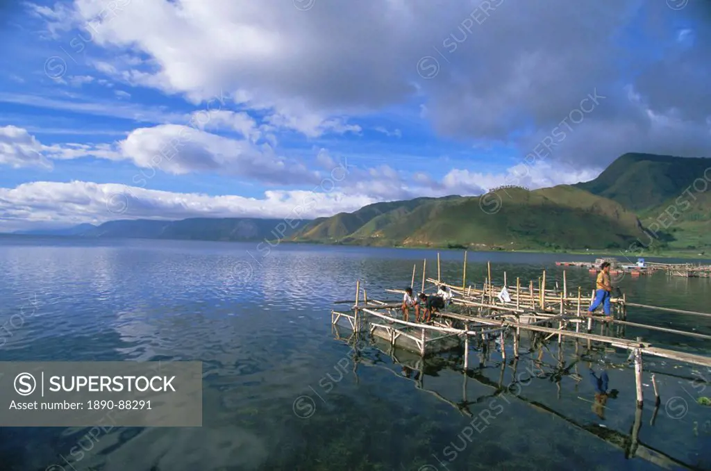Fish rearing cages, Tongging, northern tip of Lake Toba, Southeast Asia´s largest lake, North Sumatra, Sumatra, Indonesia, Southeast Asia, Asia