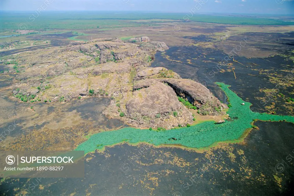 Aerial of a billabong, the backwater of a river on the floodplain of the East Alligator River near the border of Arnhemland and Kakadu National Park, ...