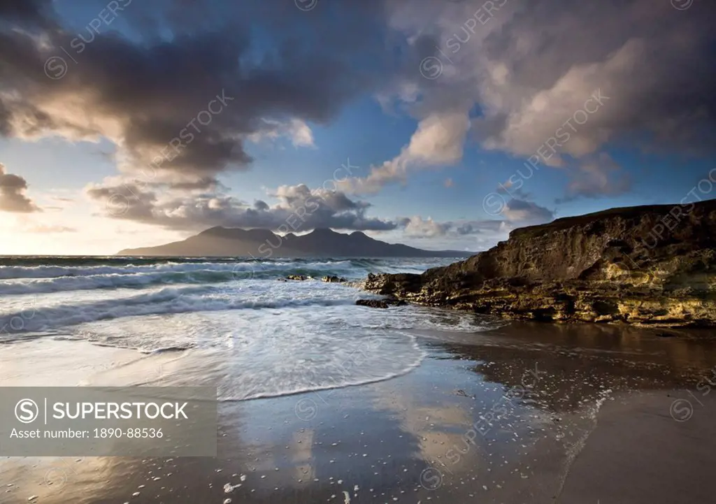 View towards Isle of Rum from Singing Sands Camas Sgiotaig, Isle of Eigg, Inner Hebrides, Scotland, United Kingdom, Europe