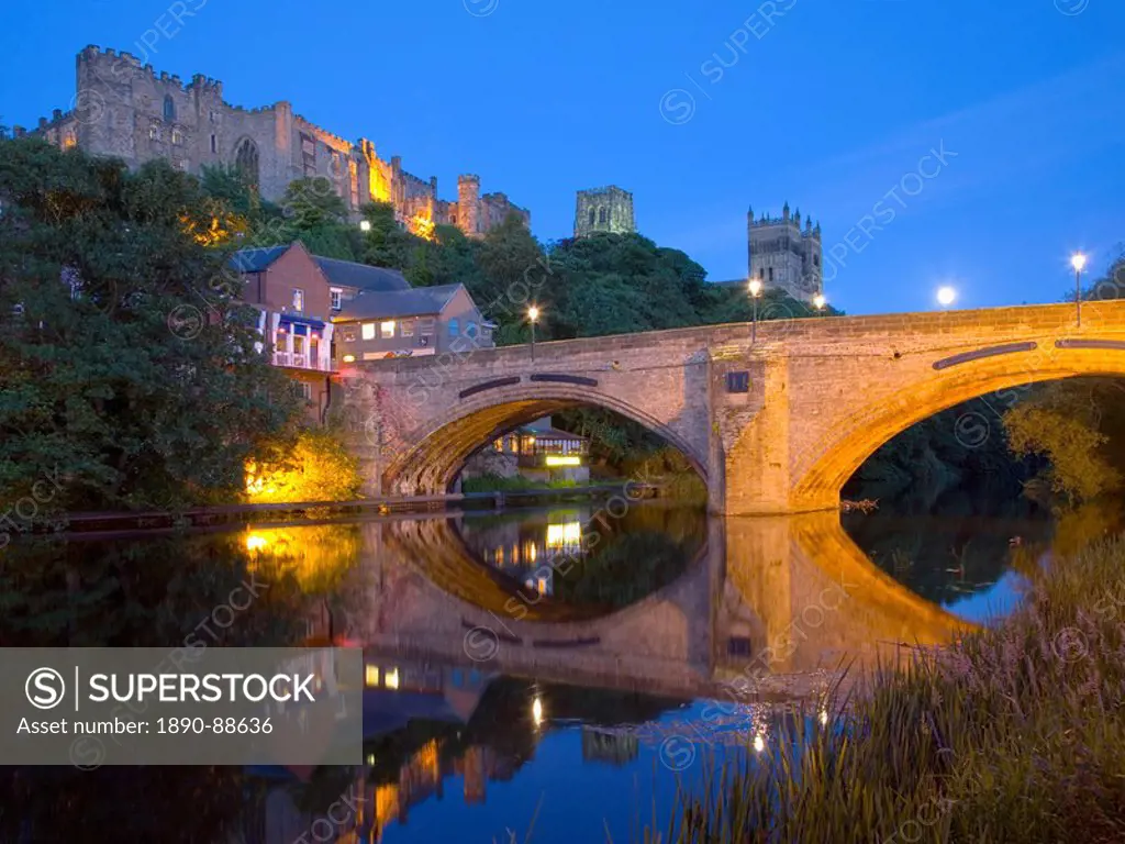 View to the illuminated castle and cathedral across the River Wear below Framwellgate Bridge, Durham, County Durham, England, United Kingdom, Europe