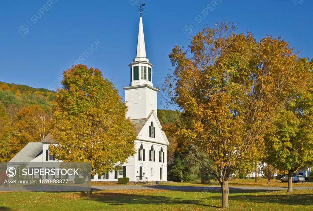 Autumn colours around traditional white timber clapperboard church, Townshend, Vermont, New England, United States of America, North America