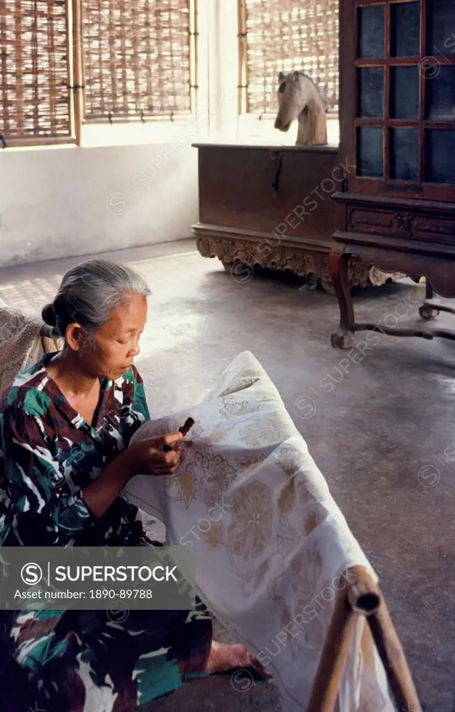 Woman preparing batik printing in Solo, Java, Indonesia, Southeast Asia, Asia