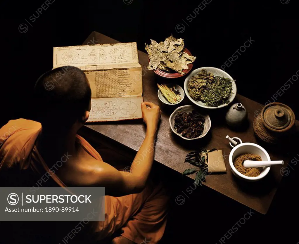 Thai monk preparing herbal medicines, Thailand, Southeast Asia, Asia