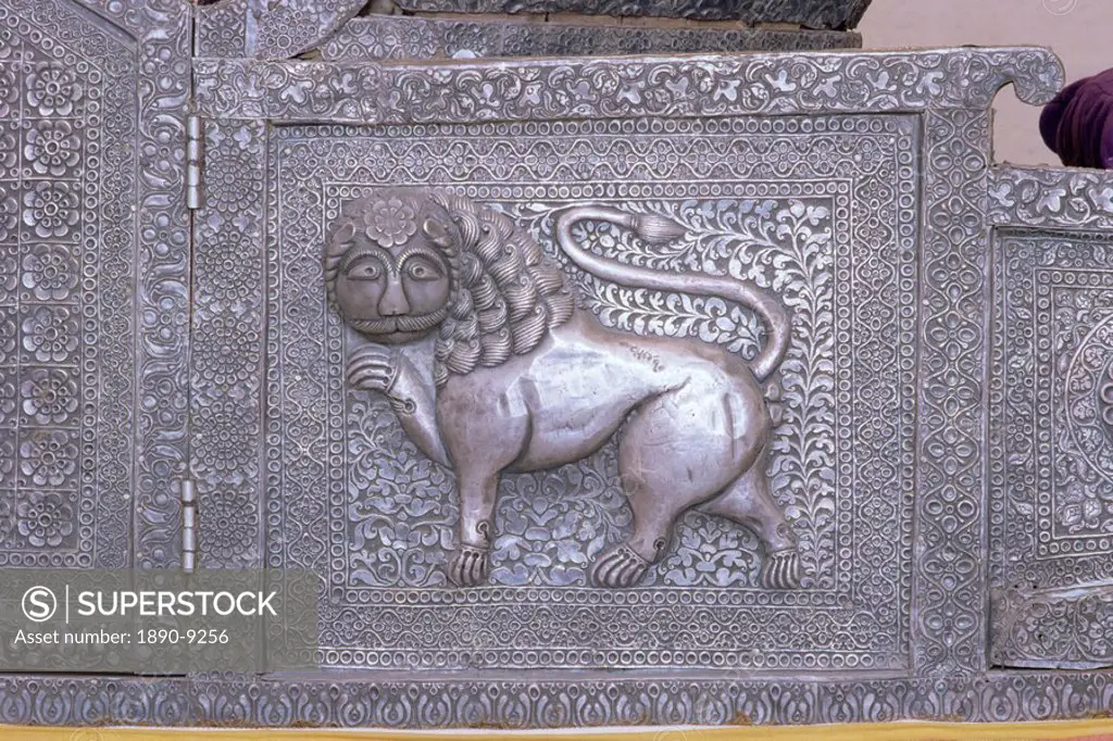 Beautiful raised silver work on panel on the side of an elephant howdah, Mehrangarh Fort Museum, Jodhpur, Rajasthan state, India, Asia