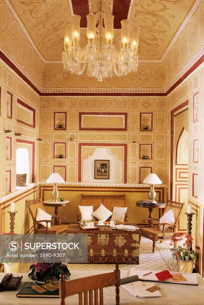 Reception area for arriving guests with reproduction colonial style furniture, painted walls and ceiling, Samode Palace Hotel, Samode, Rajasthan state...
