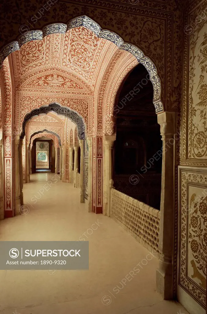 Duo tone intricately hand painted hallway running parallel to the Durbar Hall, Samode Palace, Samode, Rajasthan state, India, Asia