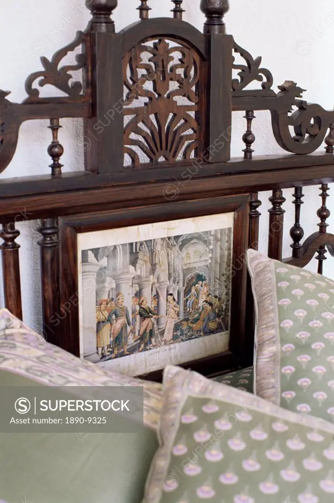 Detail of colonial style bed, with inset of 19th century print of courtly scene, residential home, Dehra Dun, Himalayan foot hills, Uttar Pradesh stat...