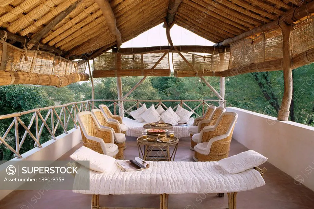 Seating area on the roof terrace of an old farm house conversion now a residential home, Amber, near Jaipur, Rajasthan state, India, Asia