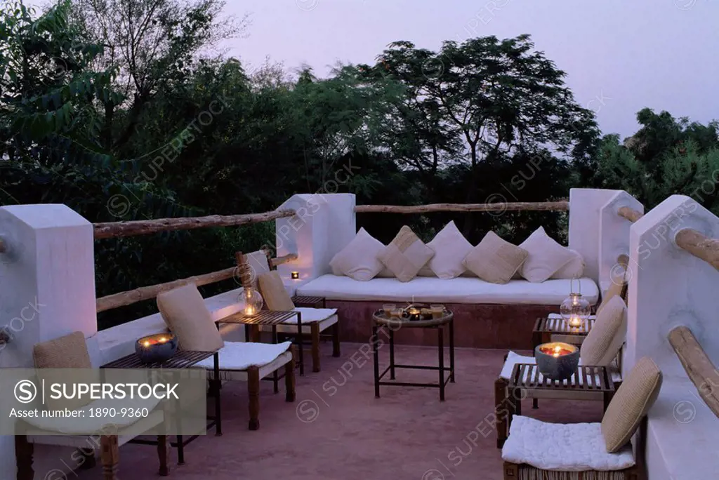 Seating area on the roof terrace of an old farm house conversion now a residential home, Amber, near Jaipur, Rajasthan state, India, Asia