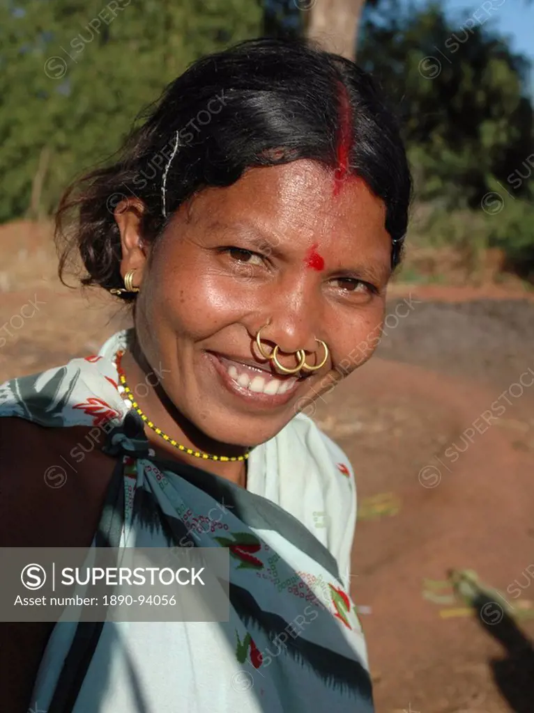 Smiling Dongoria Kondh married woman, with tribal nose rings, Kuvi Kondh village, Orissa, India, Asia